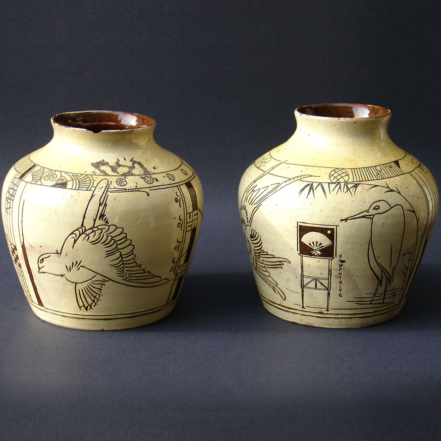 A pair of Godwin Vases for William Watt electrical