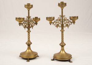 A pair of brass candlesticks-0