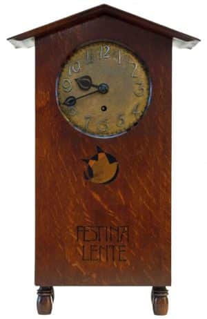 A rare inlaid oak mantle clock -0