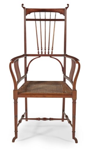 An Aesthetic Movement mahogany armchair.