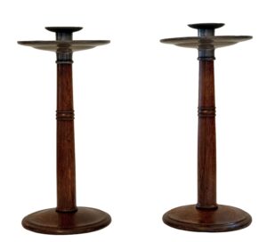 A pair of Arts & Crafts candlesticks